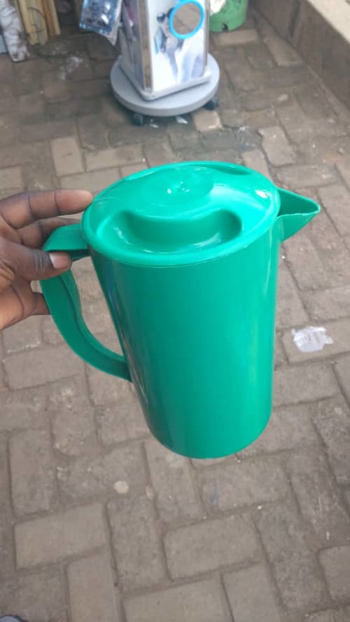 green plastic pitcher